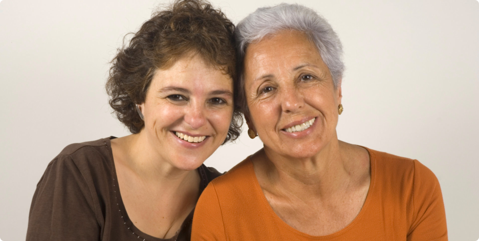 Caregiver helping an Elderly Woman