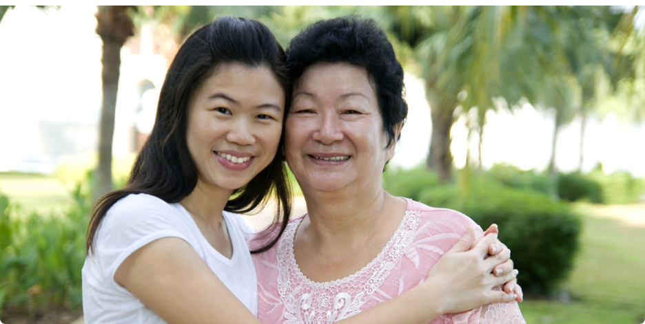 Old Woman and caregiver doing thumbs up