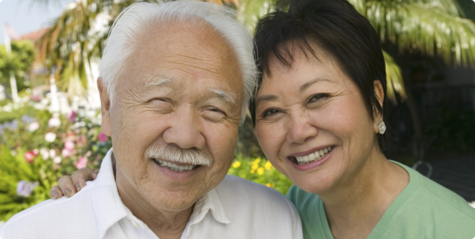 Caregiver helping an Elderly Woman